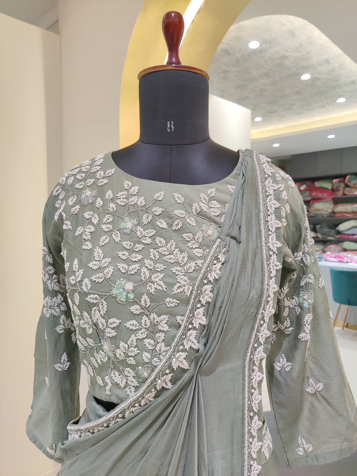 Drape style saree with pearl work